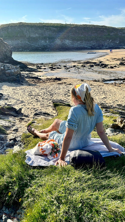 Mozzie Cozzie great for a rest on the beach - roll up for your vitamin D boost and a spot of paddling.  Model height 5'8''/173cm, UK size 12/14.